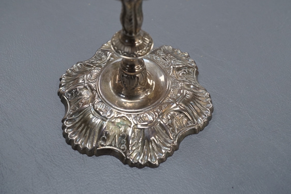 A George II cast silver taperstick, makers mark rubbed, London, 1750, 12cm.